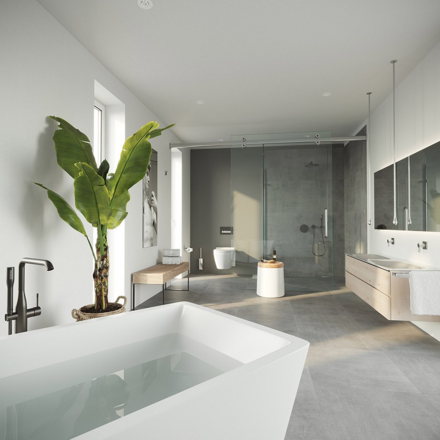 large bathroom with vegetation and modern faucets
